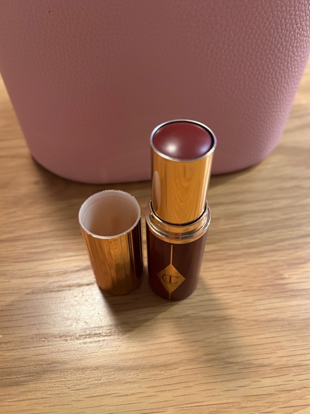 Charlotte Tilbury Unreal Lip + Cheek Glow Blush Stick Color: Berry Glow New